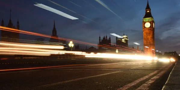 long exposure of traffic in front of big ben in london