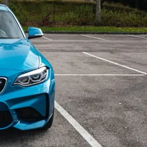 blue car in a parking space