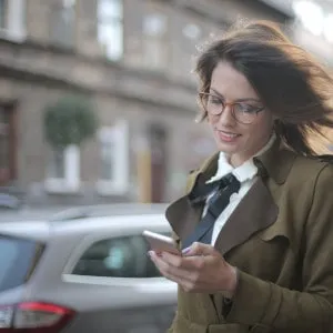 person on phone in the street