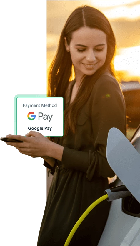 Woman smiling and charging her car