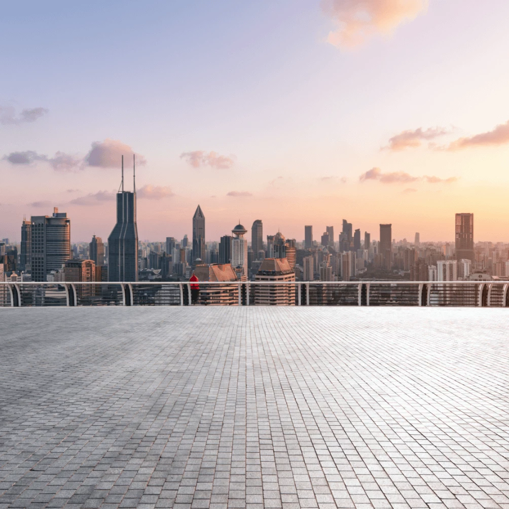 Photo of the city seen from the rooftop of a building