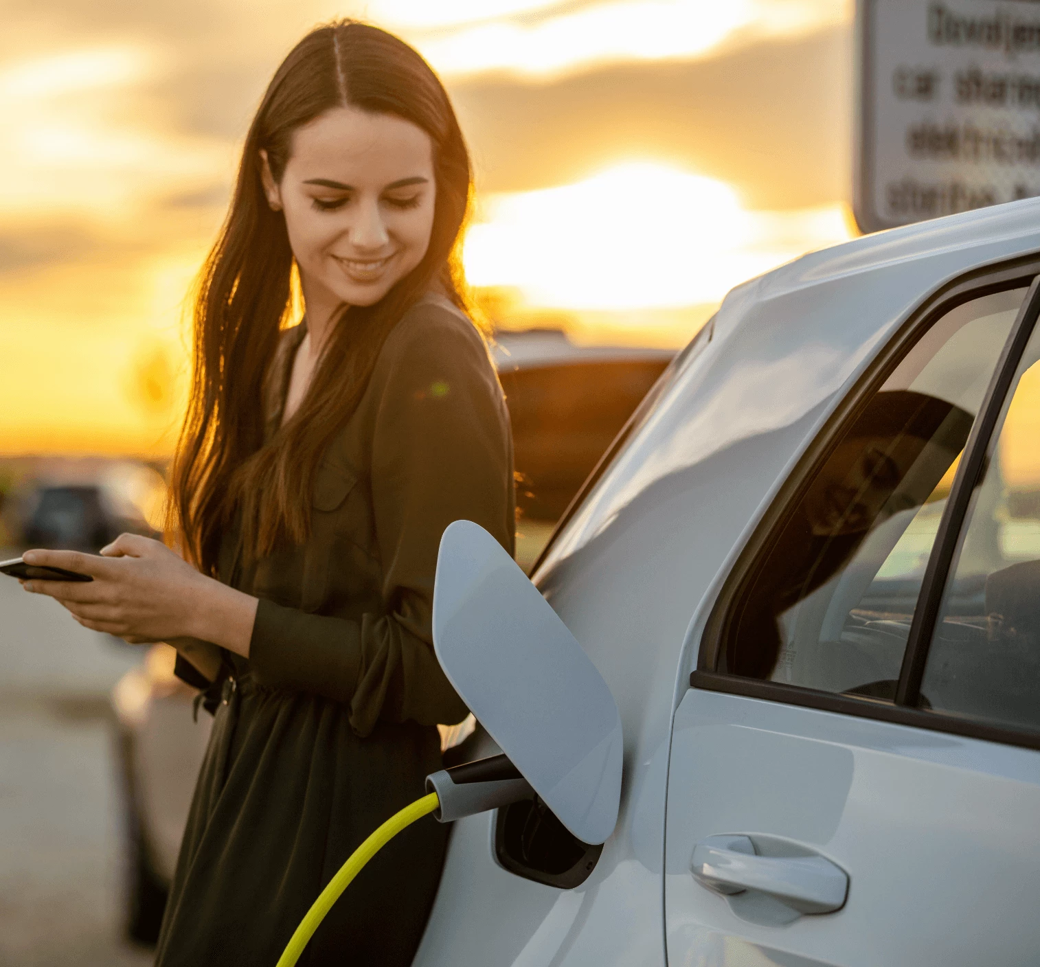 Woman charging her car